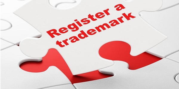 Register A Trademark on White puzzle pieces background